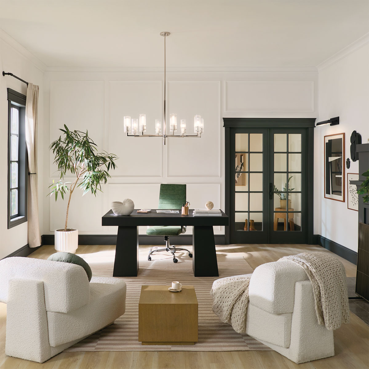 chandelier hanging above desk