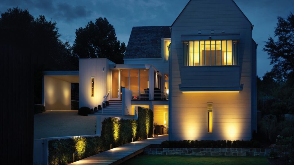 well lit porch with layered lighting at night