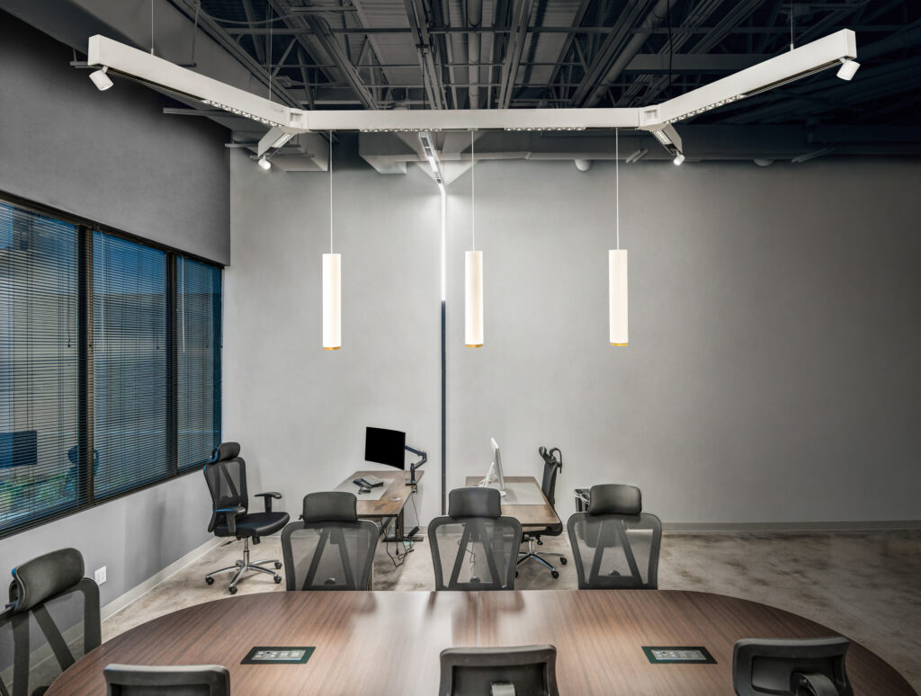 Office in the evening, with hanging pedestal lights